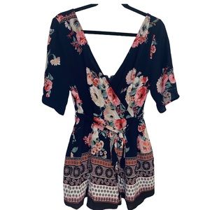 Juniors/women’s floral romper by three pink hearts 💕 super cute, large
